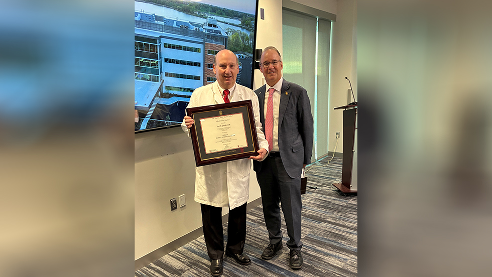 two people posing for a photo