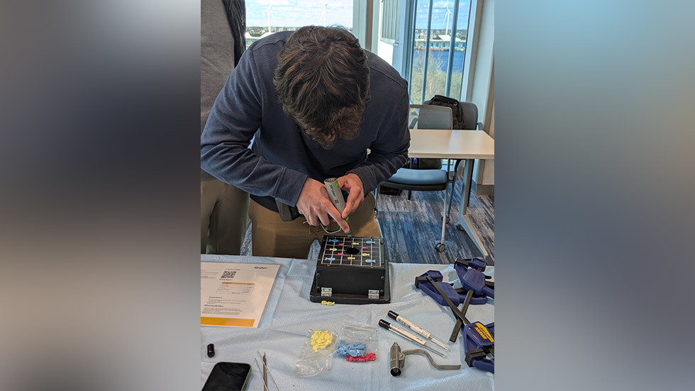 person using a drill